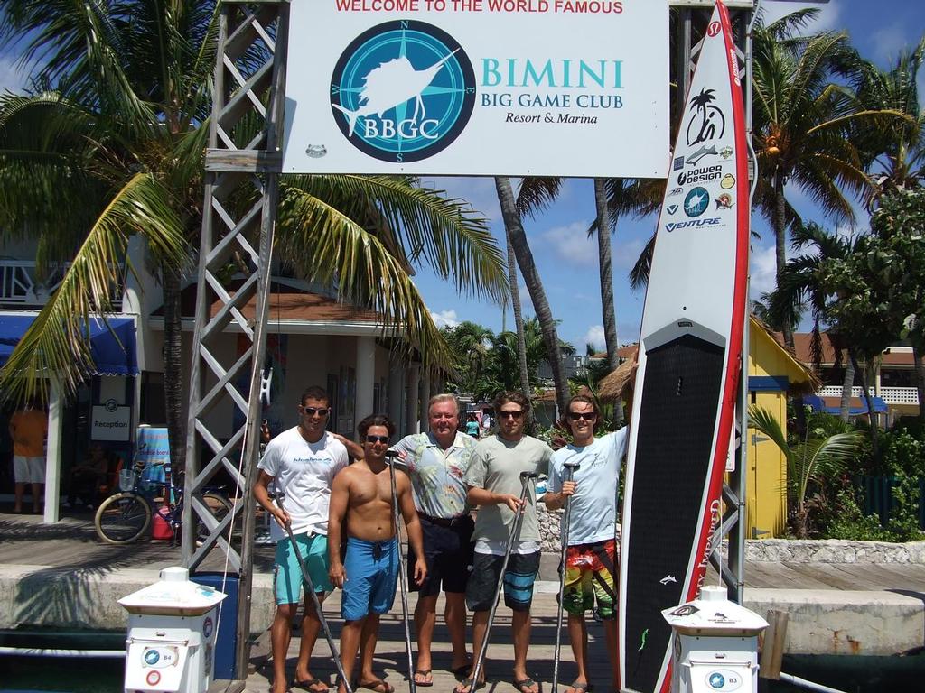 Paddleboarders pose with General Manager Michael Weber on the Docks at the Bimini Big Game Club - Crossing for a Cure © John Bell